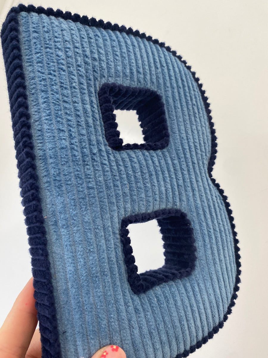 Contrasting trim corduroy letters Buttons and Bells