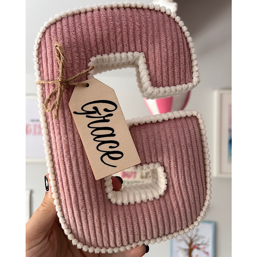 Contrasting trim corduroy letters