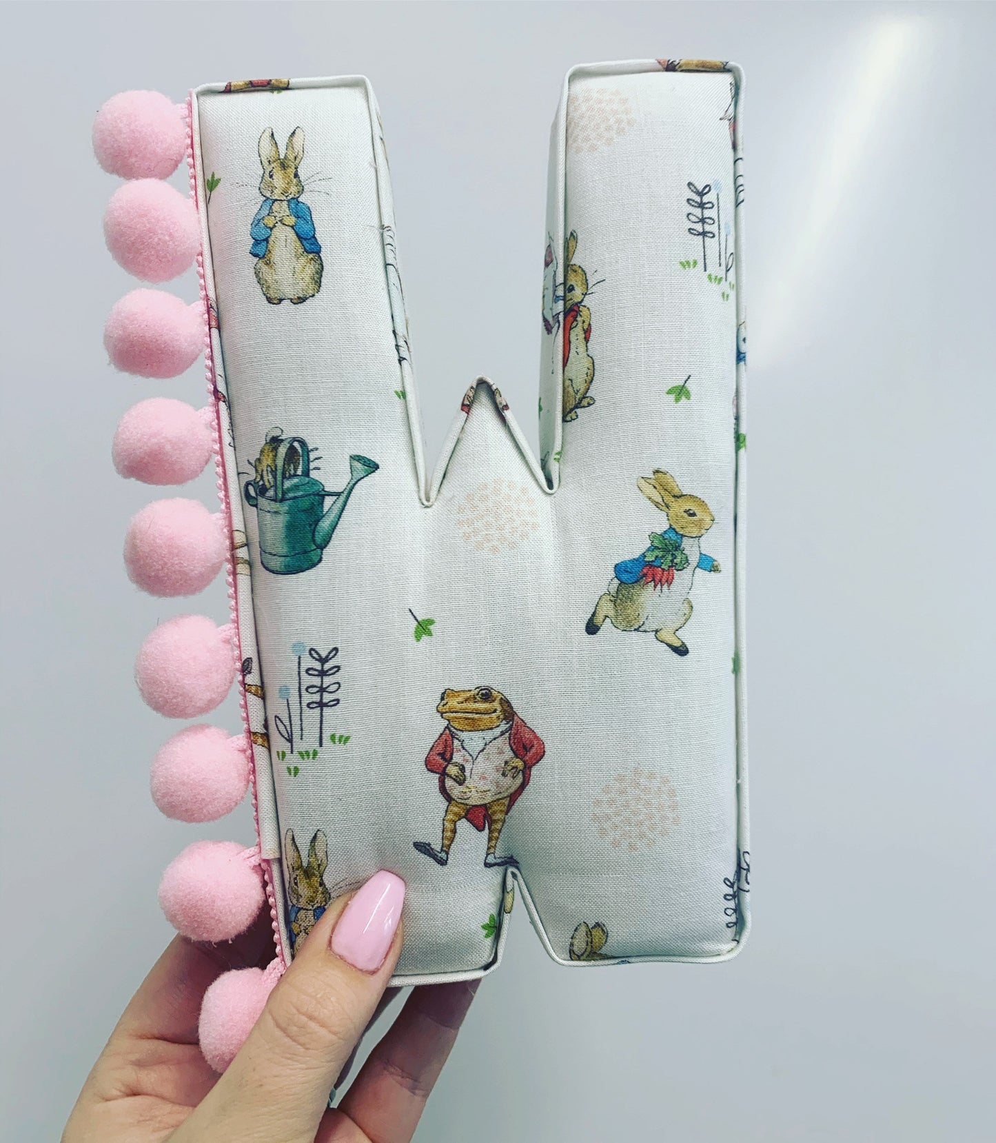 Beatrix potter fabric pompom letter.