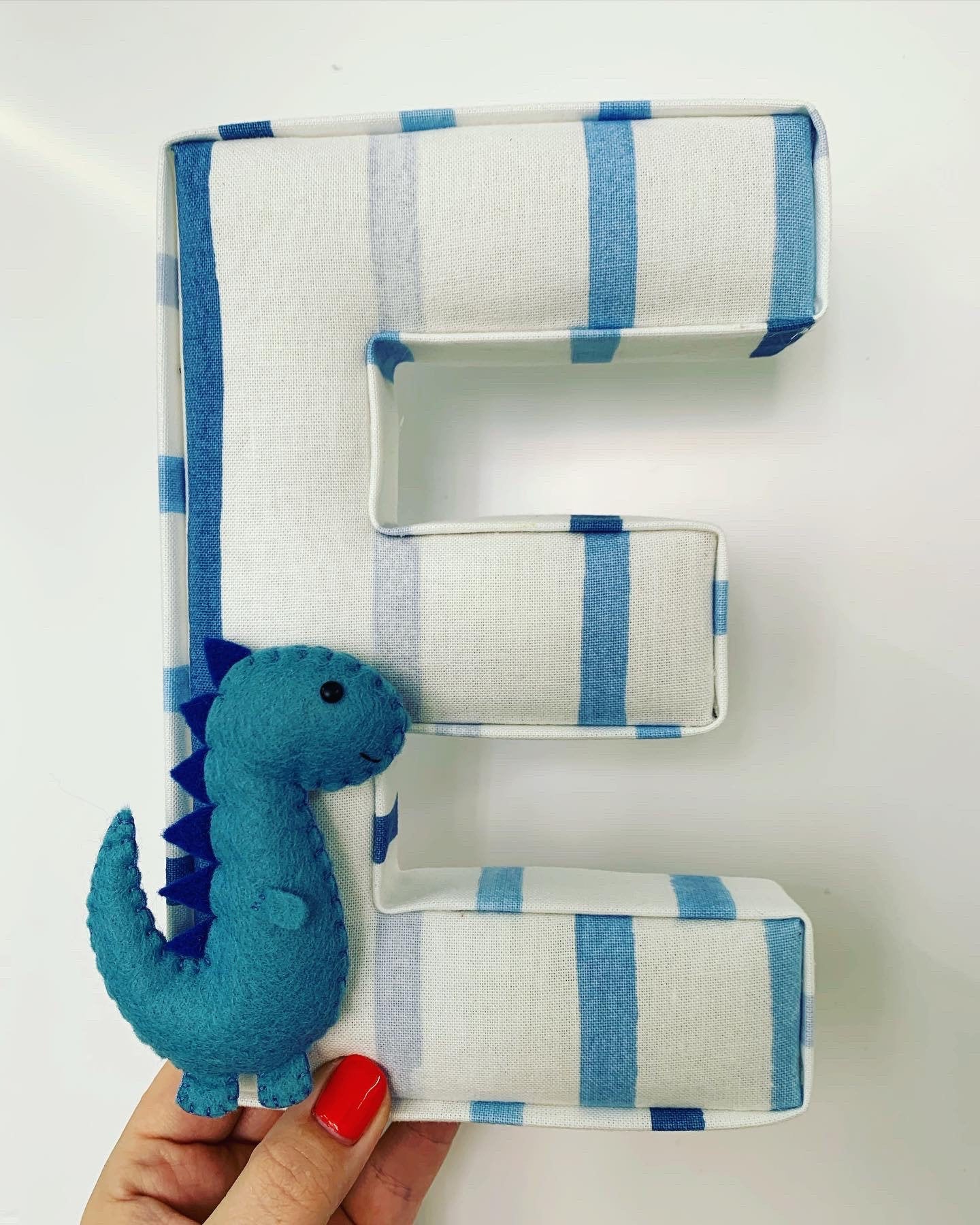 Personalised blue fabric letter with felt dinosaur