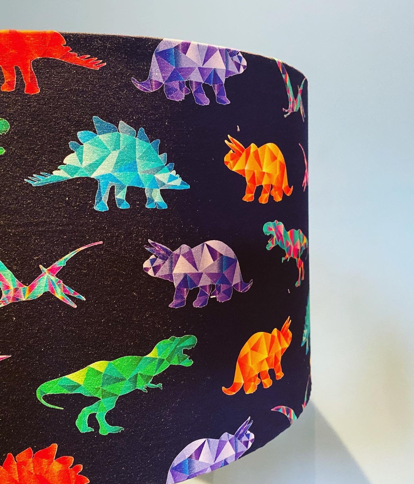Bright geometric dinosaur lampshades