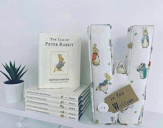 Beatrix potter fabric pompom letter.