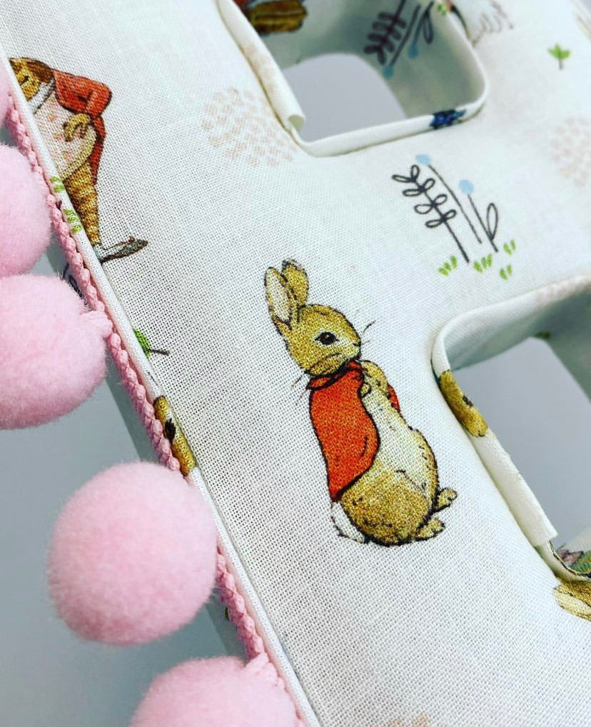 Beatrix potter fabric pompom letter.