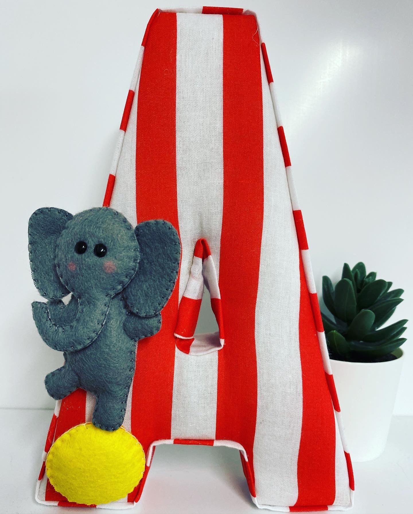 Personalised circus fabric letter with felt character